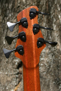 The neck is is a 5-layer neck made from mahogany and bubinga